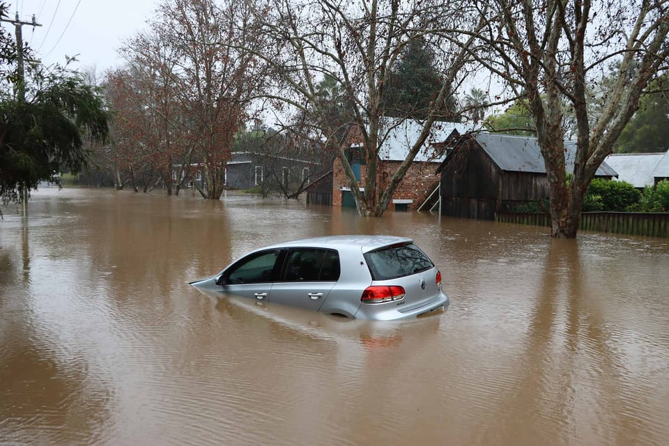 Photo of a flooded car.